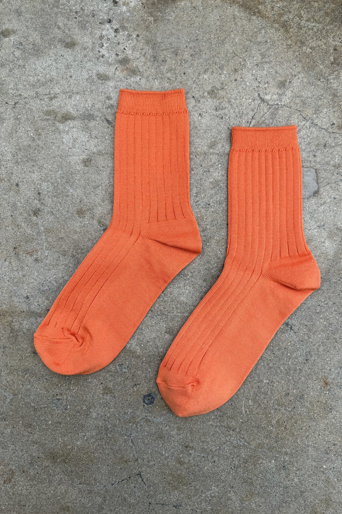 Her Socks in Tangerine